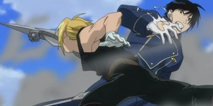 Edward Elric với cánh tay kim loại nhìn về phía Đại tá Roy Mustang