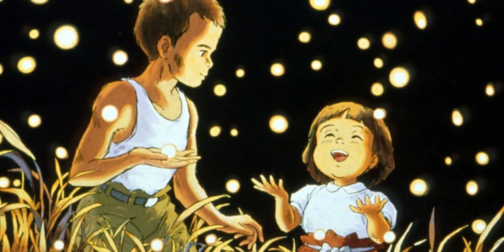 Hai anh em Seita và Setsuko bên cạnh những đốm sáng đom đóm, hình ảnh cảm động về sự sống sót trong chiến tranh từ phim Mộ Đom Đóm của Studio Ghibli