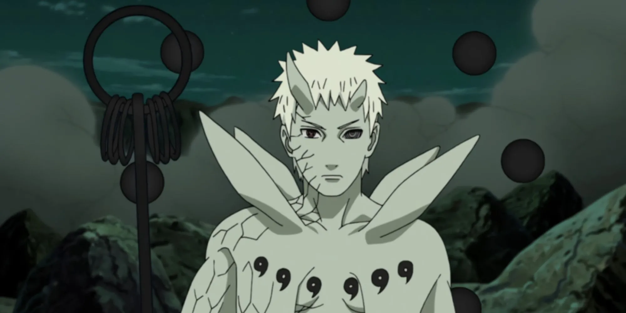 Obito Uchiha trong Naruto, sở hữu Sharingan, Rinnegan và Cầu Đạo Ngọc.