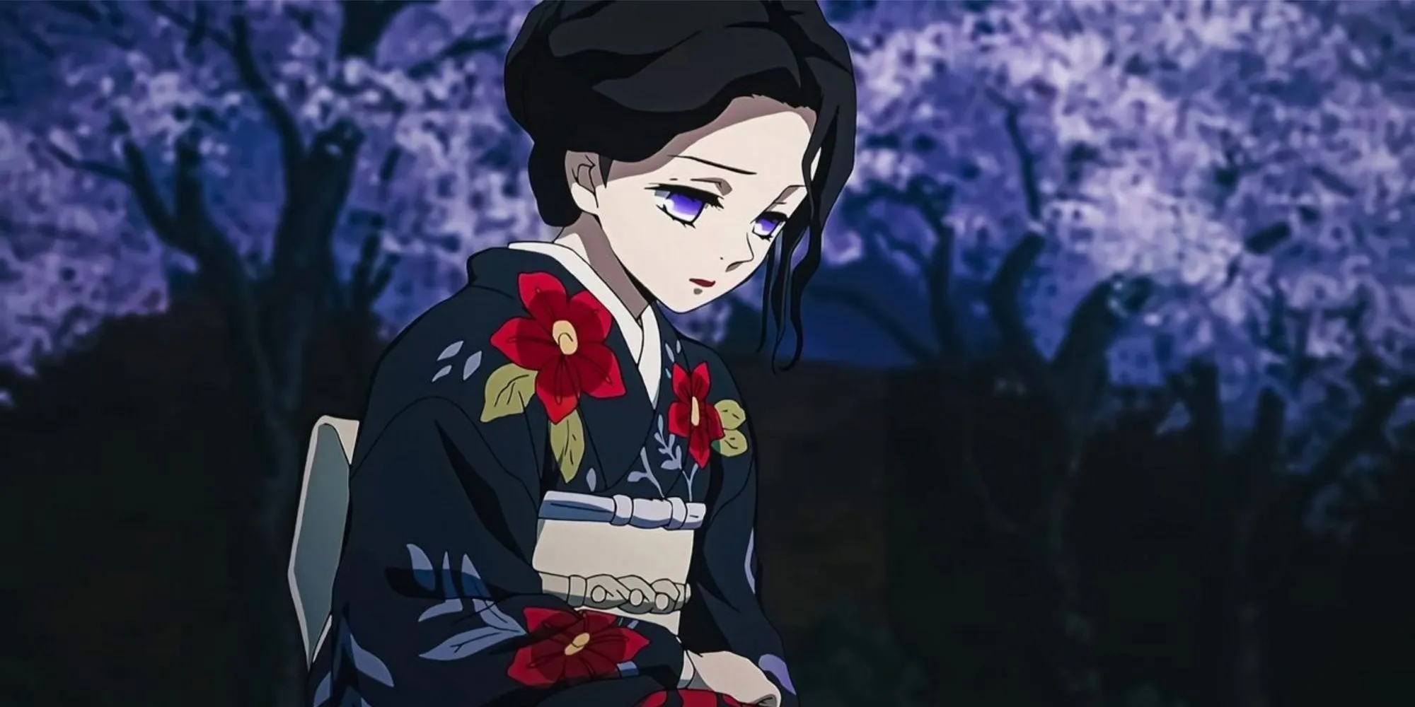 Tamayo ngồi tựa đầu bên cây hoa tử đằng trong Kimetsu no Yaiba
