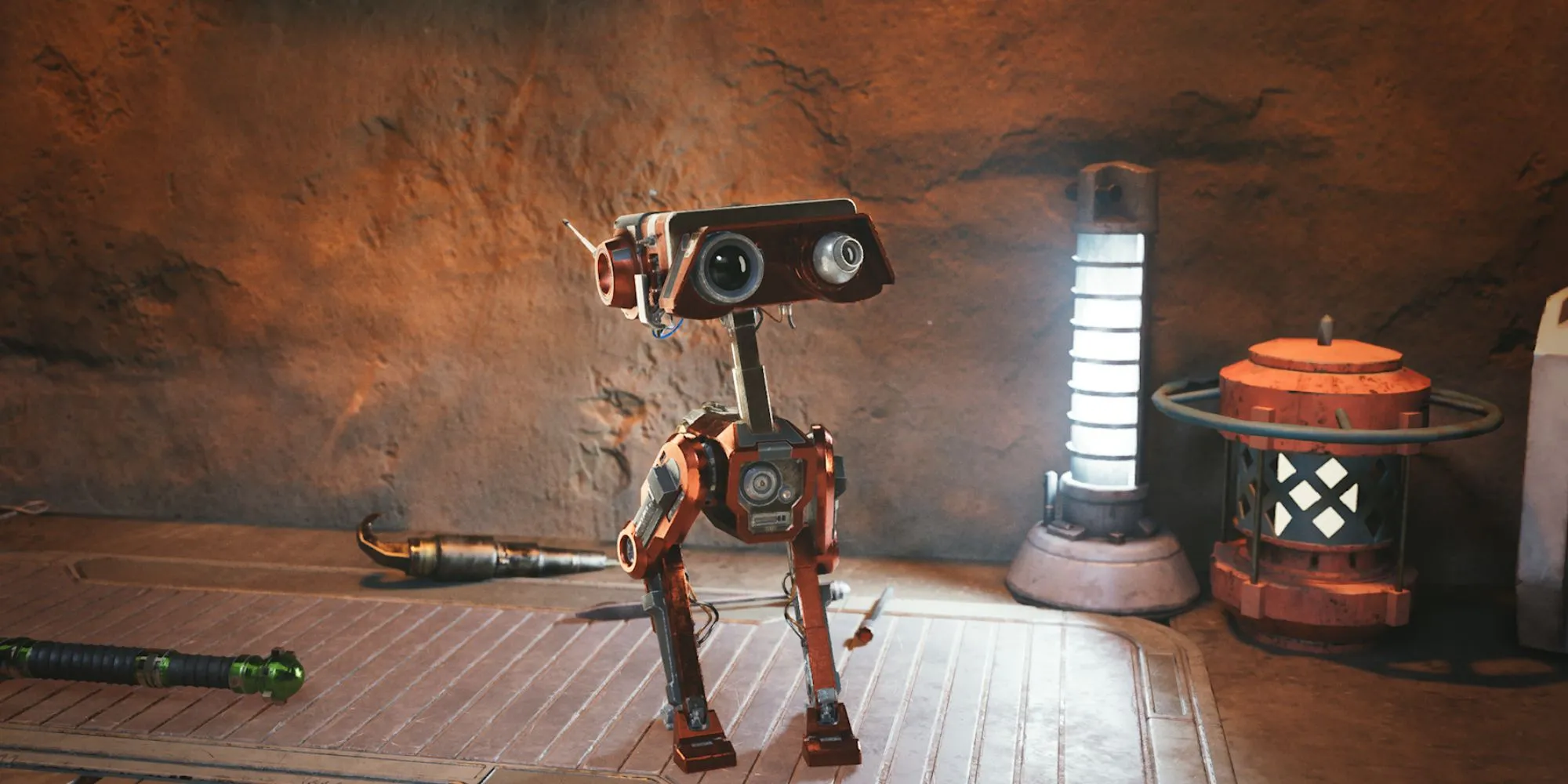 BD-1, droid nhỏ bé đáng yêu từ Star Wars Jedi Survivor, đang được kiểm tra trên bàn làm việc.